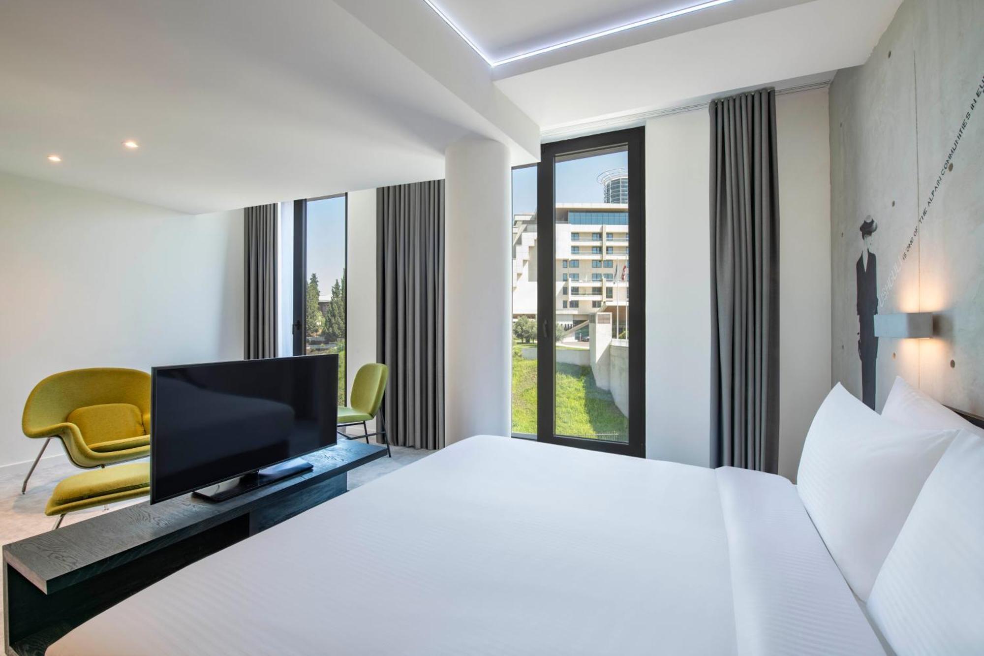 Golden Tulip Design Tbilisi Hotel Quarto foto